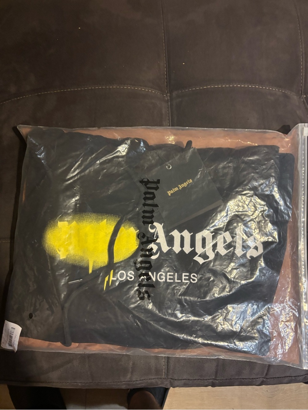 Palm Angels Black Hoodie with Yellow Spray Graphic
